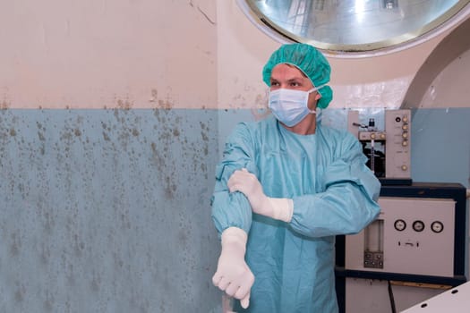Surgeon prepare its clothes before coming difficult surgery
