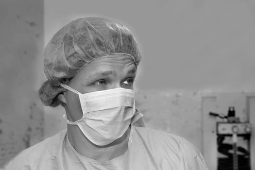 Shaded surgeon making some thoughts about coming surgery