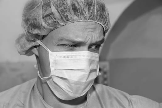 Shaded surgeon have thoughts about coming difficult surgery