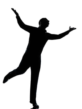 one caucasian business man  happy spreading arms silhouette Full length in studio isolated on white background