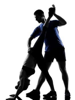 couple woman man exercising workout fitness aerobics posture in silhouette studio isolated on white background