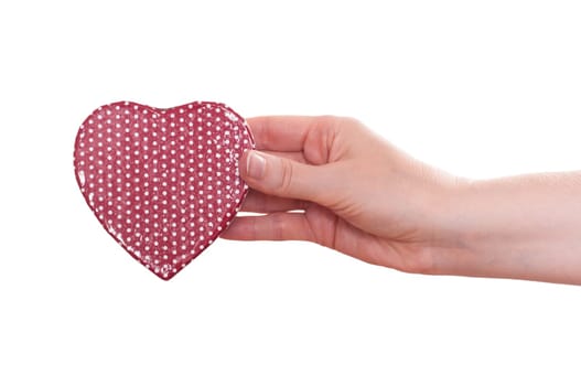 Red Hers is held by a female hand