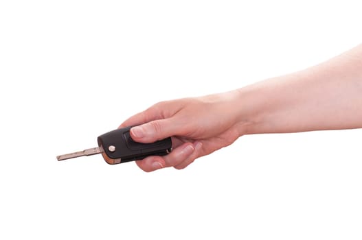 White isolated hand holding a car key forward