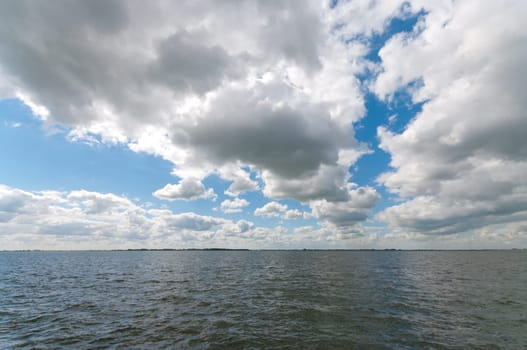 nice cloudy sky over the IJsselmeer, a lake in the Netherlands