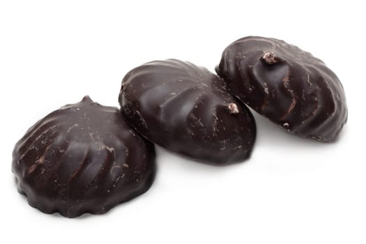 Zephyr in chocolate, three pieces lies on white background inline
