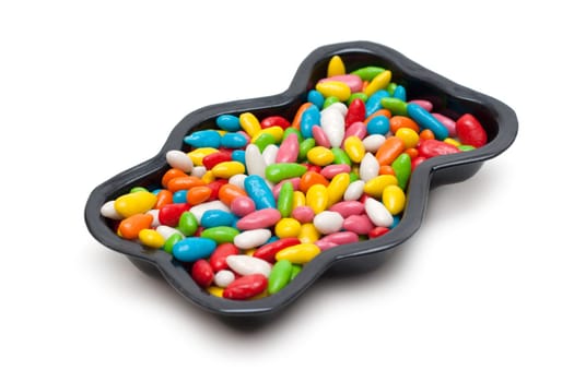 Teflon form pervaded sweetmeat in colour glaze on white background