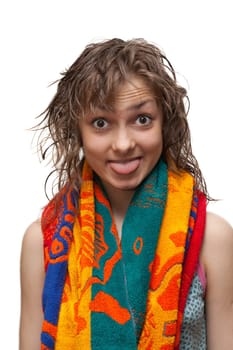 Beautiful girl with wet hair and towel on neck show language