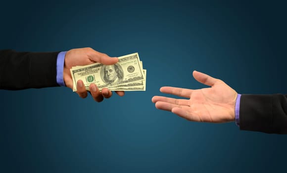 business man holding money in hand
