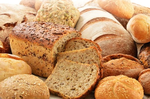 Composition with bread and rolls in wicker basket