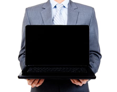 Business man holding a blank laptop for copy space on isolated backgroun