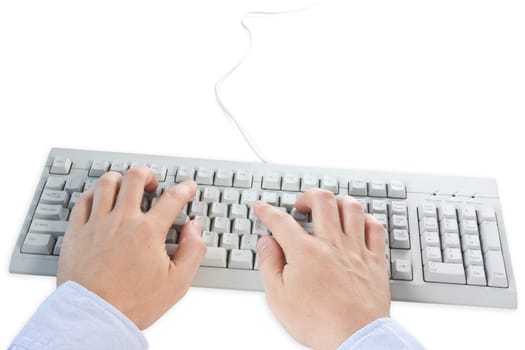 hands typing on a grey computer keyboard