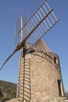 Ancient stone windmill (near village Grimaud, Provence, France)