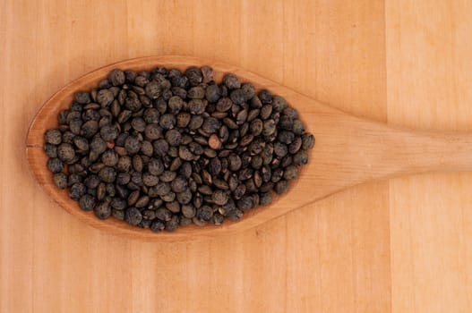 Close-up Alb lenses on a spoon