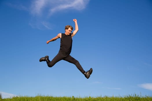 Sportsman making jump from one place to another