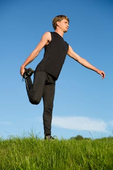 Sportsman is stretch right leg crook on behind