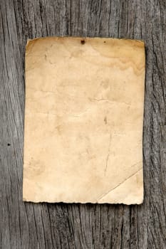 old paper on wood background