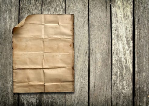 old paper on wood background