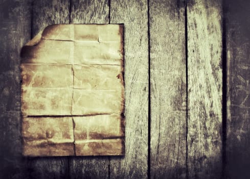 old paper on wood background