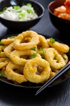 Fried calamari rings with yogurt garlic dip
