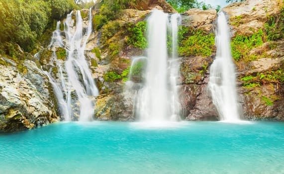 Beautiful panorama of waterfalls at summer day