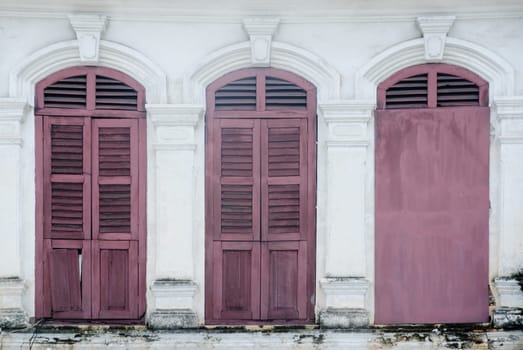 old window in phuket, thailand