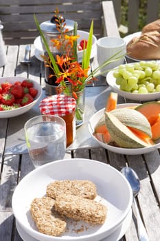 Outdoor table set for breakfast
