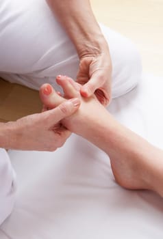 Detail foot reflexology massage