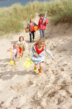 Family having fun on beach vacation