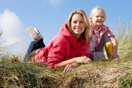 Mother and daughter outdoors
