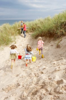Family having fun on beach vacation