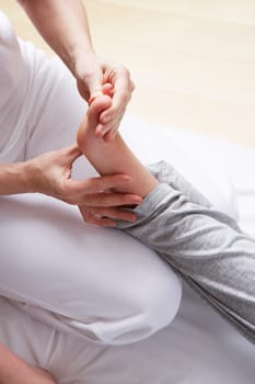 Detail foot reflexology massage