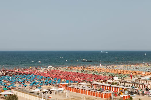 Large group of parasoles at the beach