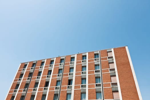 Brick Wall building towards blue sky