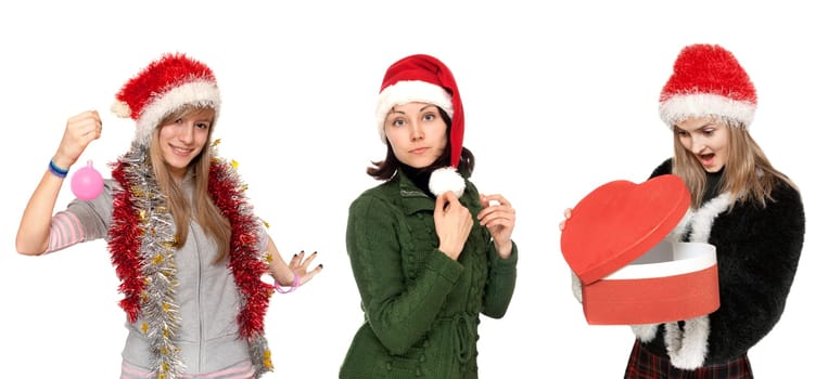 Three girls in cristmas hat with gift on white background