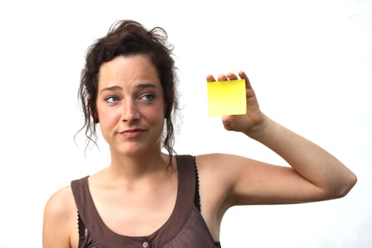 young woman with yellow note paper
