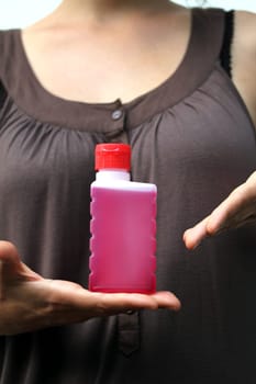 red fluid in hands