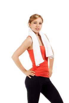 Portrait of happy sportswoman with towel against white background