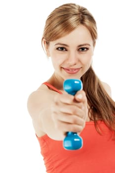 Pretty young sportswoman showing fitness dumbbell against white background