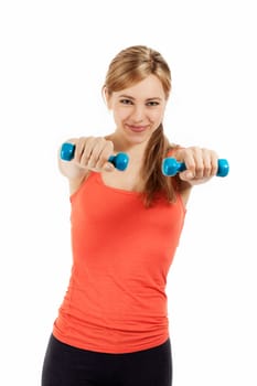 Pretty blonde sportswoman training with fitness dumbbells against white background