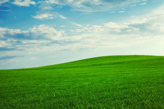Beautiful green hills with blue sky
