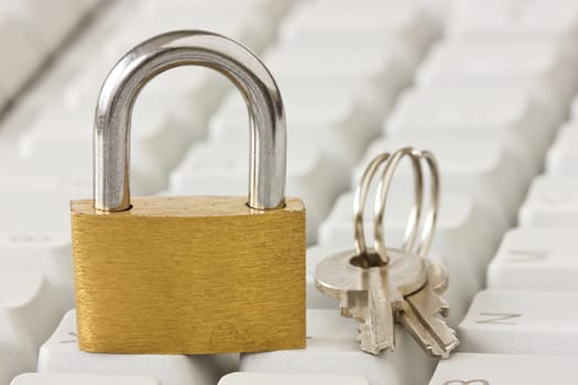 padlock with a keys on computer keyboard