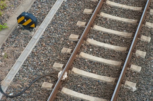 sensor at railway track for electronic control