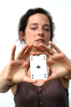 young woman holding a ace playing card