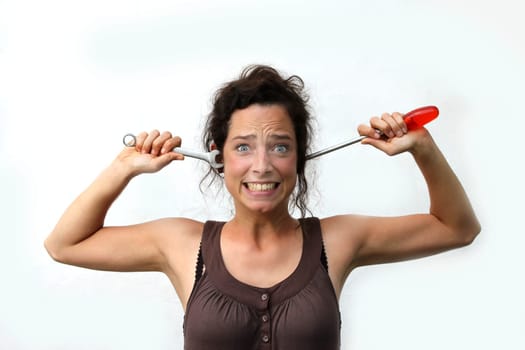 funny young woman with tools