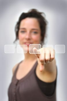 young woman pointing at a digital interface