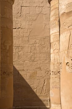 Columns with hieroglyphs  of the Great Hypostyle Hall at the Temples of Karnak. Luxor, Egypt