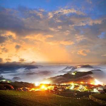 Amazing sunrise and mountain of cloud with mountains and tree