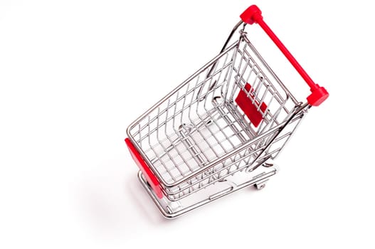 Shopping cart from above against a white background