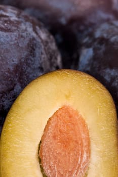 Sliced plum with pit and pulp