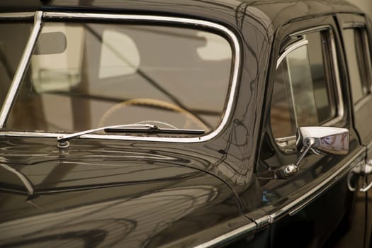 Retro car  driver seat view in car museum